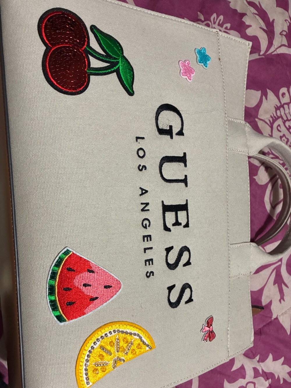 GUESS Cream Canvas Tote with Fruit Appliqués